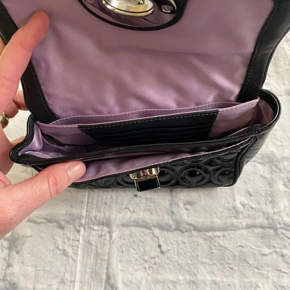 Coach mini shoulder/crossbody bag w/twist latch closure w/satin inner lining